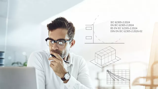 A person looking at the screen of a laptop. 